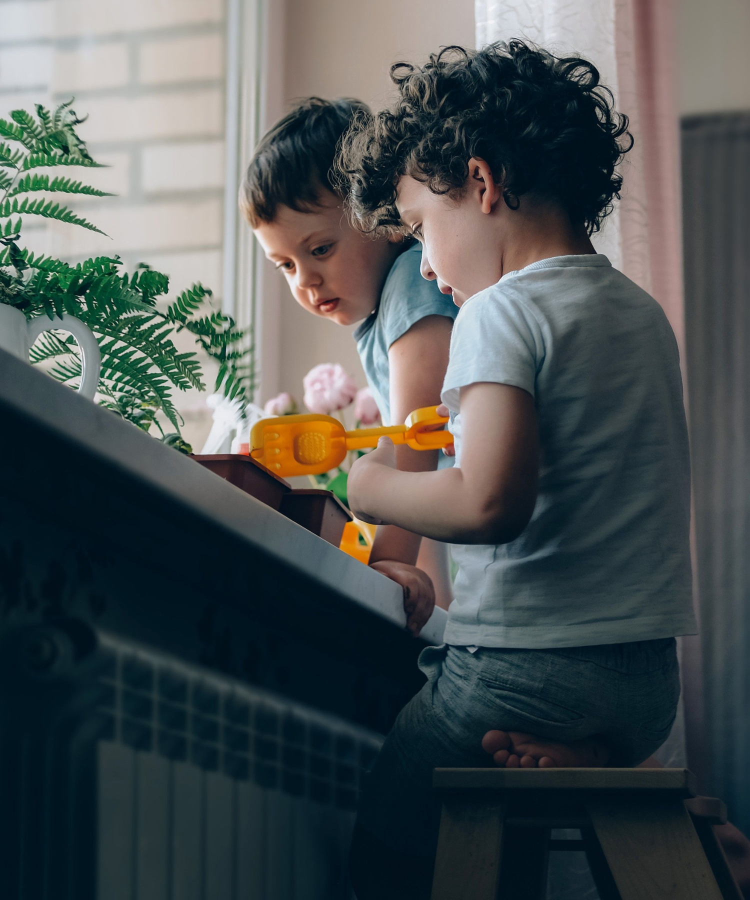 Two young children playing